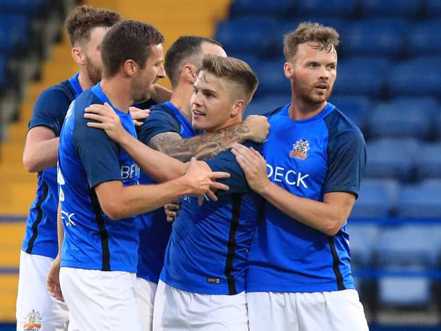 Josh Daniels celebrates his goal for Glenavon against Molde