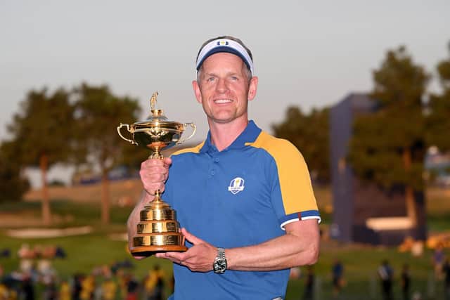 Luke Donald, Captain of Team Europe poses with the Ryder Cup at Marco Simone Golf Club in Rome, Italy. (Photo by Ross Kinnaird/Getty Images)