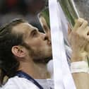 Real Madrid’s Gareth Bale kisses the trophy after the Champions League final against Atletico Madrid in 2016
