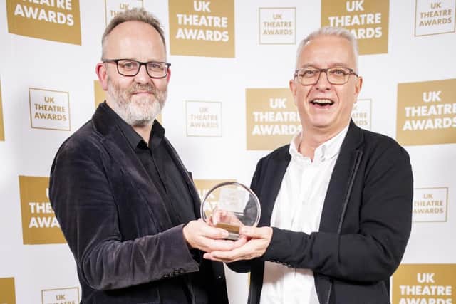 The Lyric Theatre's Jimmy Fay and Philip Crawford with one of the awards. The Belfast theatre won gongs in two categories, one for its co-production of Brian Friel's Translations with the Abbey Theatre and another for its actor training programme