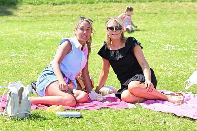 Sun worshippers pictured at Hazelbank Park in Newtownabbey - Patricia McFadden and Seaneen McKeown. Photo: Stephen Hamilton/Presseye