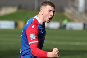 Linfield's Ethan McGee celebrates his goal against Institute. PIC: Desmond Loughery/Pacemaker Press
