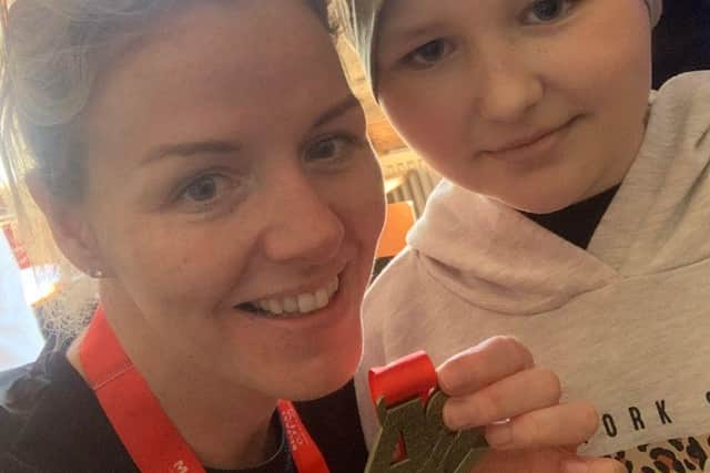 Poppy inspired her auntie Carina to take on the full Belfast marathon