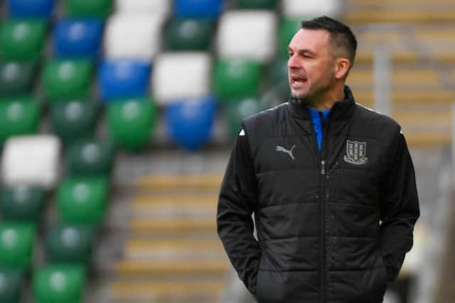 Ballymena United chief Jim Ervin was left than impressed with the officiating during his side's Irish Cup exit to Linfield