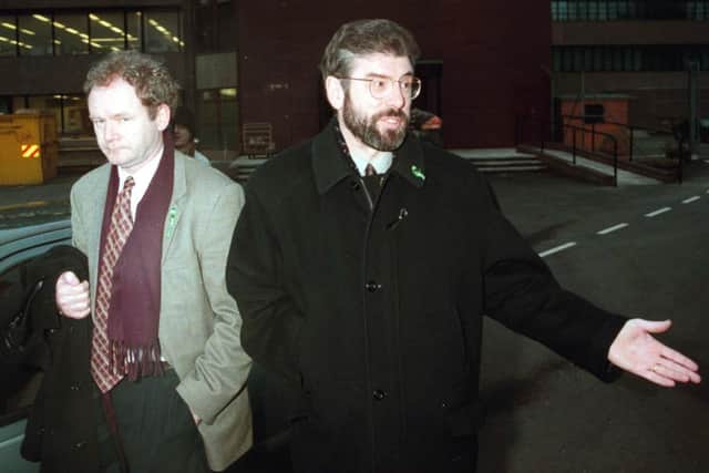 The then Sinn Fein leader Gerry Adams (right) accompanied by Martin McGuinness as he leaves Stormont after meeting with Northern Ireland Secretary Sir Patrick Mayhew