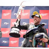 Peter Hickman with the Senior TT trophy after he retained the prestigious silverware in Saturday's six-lap showdown on the Isle of Man