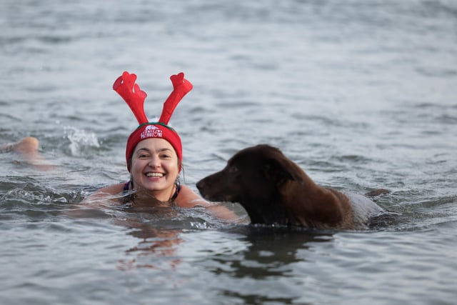 Press Eye - Belfast -  Northern Ireland - 24th December 2023 - 

Swimmers take part in the annual Helens Bay Christmas Eve dip at Helens Bay beach, Co Down 

The event also raised funds for PIPS Suicide Prevention and East Belfast Survivors of Suicide. 

Photo by Kelvin Boyes / Press  Eye. 
:-