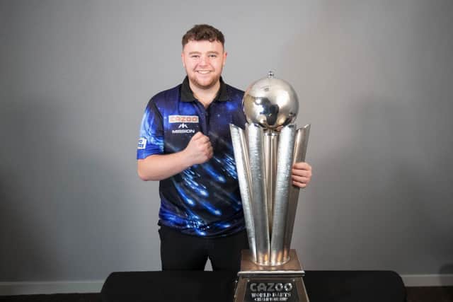 Josh Rock with the Sid Wadell Trophy ahead of this month's Darts World Championships at Alexandra Palace.