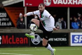 Glentoran winger Niall McGinn says the players have to also take criticism for results this season after Warren Feeney's recent departure