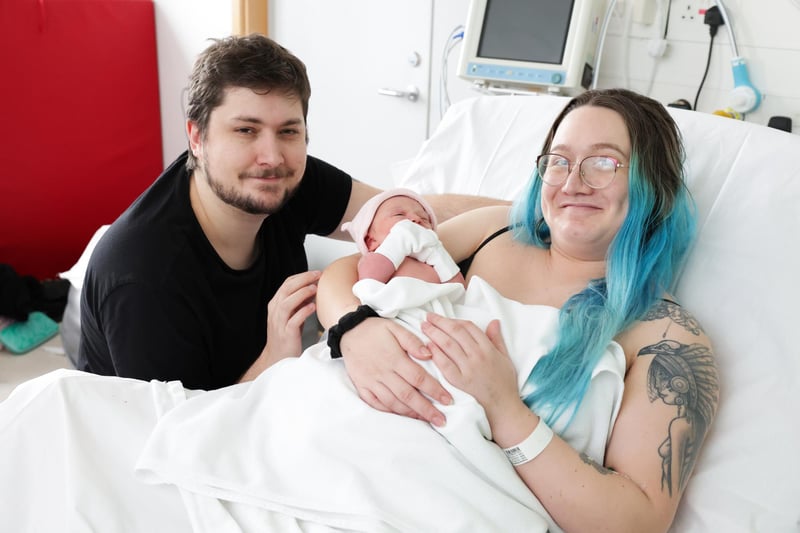 Bangor parents Rosie Coles and Mathew Moses with newborn baby Violet Roberta Moses, born at 8.45am weighing 8.1lbs in the Ulster Hospital. (Photo by Kelvin Boyes/Press 
Eye)