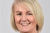 Councillor Tracy Kelly hopes to convince Belfast City Council to cut rates bills for struggling Sandy Row businesses.