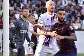 Linfield’s Chris Shields and Pogon Szczecin's Joao Gamboa pictured in action during Thursday night’s Europa Conference League game