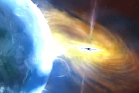 Scientists believe that the explosion, known as AT2021lwx, is the result of a vast cloud of gas, possibly thousands of times larger than our sun, plunging into a supermassive black hole
