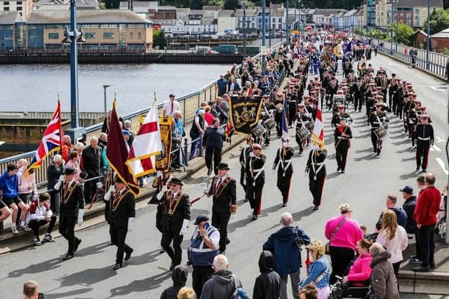 The General Committee of the Apprentice Boys of Derry leading the parade across the Craigavon Bridge