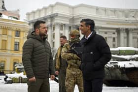 Prime Minister Rishi Sunak, speaking with Ukraine President Volodymyr Zelensky as they look at destroyed Russian military vehicles in Kyiv, Ukraine in November.
Mr Sunak is coming under pressure to make major investment in the British army in light of Russia's invasion of Ukraine.