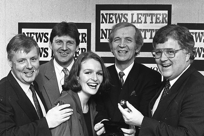 News Letter publicity executive Vivien Marshall enjoys a joke with Bass Ireland PR manager Brian Houston, during the semi final draw of the Bass Irish Cup, which was made in the News Letter offices in March 1992. Also, in the picture are, left to right, News Letter sports editor Brian Millar, Geoff Martin, News Letter editor, and Ken Hood, chairman of the IFA Senior Club Committee. Picture: News Letter archives