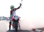 Glenn Irwin celebrates winning the feature Superbike race at the North West 200 in 2024 for his 11th victory at the event. (Photo by Stephen Davison/Pacemaker Press)