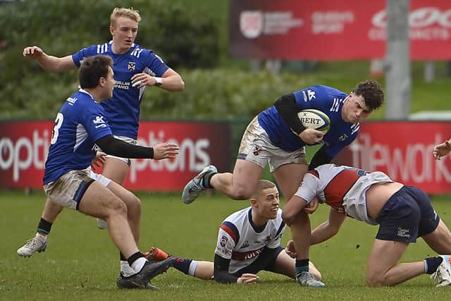 Lukas Kenny in possession earlier this year for Queen's. (Photo by Arthur Allison/Pacemaker Press)