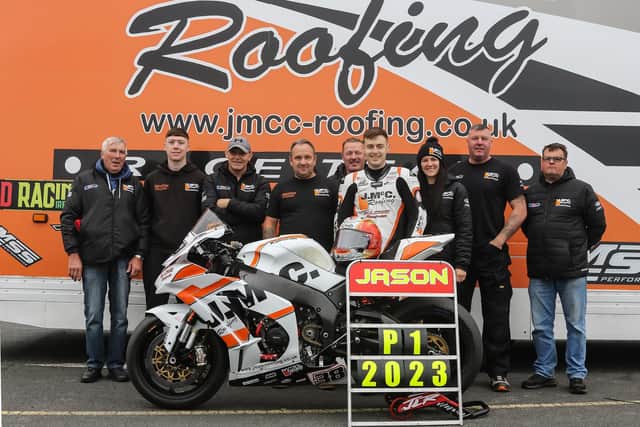Jason Lynn celebrates with the J McC Roofing Racing Team after winning the Ulster Superbike title for the first time following a double at Kirkistown in Co Down. Picture: Derek Wilson.