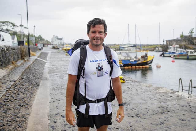 Lee Colligan in Carnlough, Northern Ireland, he is making a 2500km journey walking the Wild Atlantic Way and the Causeway Coastal Route to raise money and awareness for Myalgic Encephalomyelitis (M.E.) in honour of his 29-year-old brother Josh who passed away in August 2023.