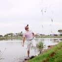Rory McIlroy plays a shot out of the water on the 16th hole during the third round of The Cognizant Classic at PGA National in Florida on Saturday