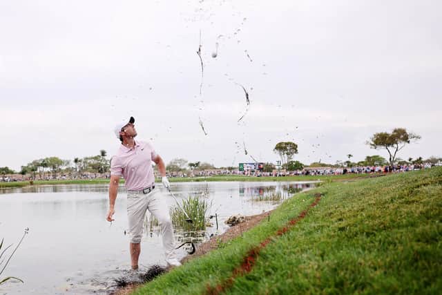 Rory McIlroy plays a shot out of the water on the 16th hole during the third round of The Cognizant Classic at PGA National in Florida on Saturday