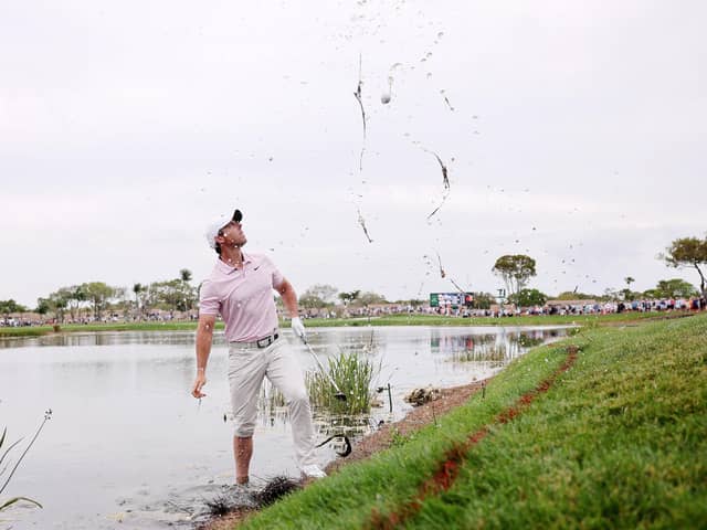 Rory McIlroy plays a shot out of the water on the 16th hole during the third round of The Cognizant Classic at PGA National in Florida on Saturday