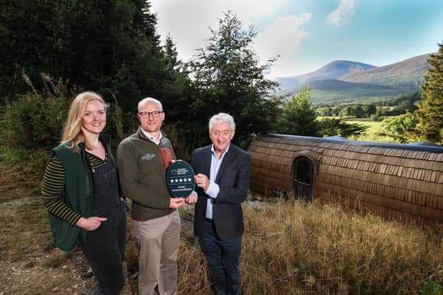 A glamping retreat in Newcastle has been awarded a five-star accommodation grade by Tourism Northern Ireland. Pictured is John McGrillen, CEO of Tourism Northern Ireland with Esme Porter and Andrew Porter, owners of Enniskeen Estate in Newcastle, which has been awarded a five-star accommodation grading by Tourism NI