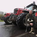 Ballygowan farmer Sam Hanna, with his dog Roy, on Sydenham by-pass in Belfast (Liam McBurney/PA Wire)