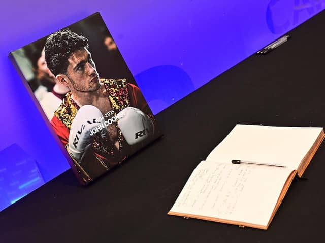 A book of condolence was opened in the Ulster Hall in Belfast to pay tribute to boxer John Cooney following his death a week after a title fight in Belfast.