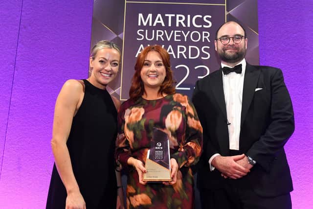 Belfast-based surveying professional Carolyn Brady has been crowned “Surveyor of the Year” at the RICS Matrics Surveyor Awards, which recognise the most inspiring and influential surveyors who have been qualified for up to 10 years. Pictured is Carolyn Brady, TV presenter Cherry Healey and Richard Golding, AssocRICS RICS Matrics UK chair 2023–24