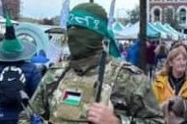 The image of a person dressed as a Hamas fighter during a Halloween event in Londonderry that was posted on social media