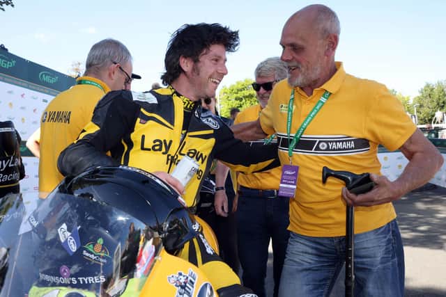 Cork racer Mike Browne with Eddie Laycock following victory in the Lightweight race at the Manx Grand Prix in 2022