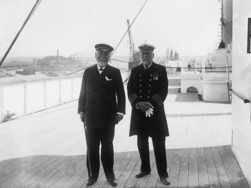9th June 1911: Captain John Smith (1850 - 1912) and Lord James Pirrie, Chairman of the Harland & Wolff Shipyard, on the deck of the White Star Liner 'Olympic'. Captain Smith later became Captain of the ill-fated 'Titanic' and went down with his ship. (Photo by Topical Press Agency/Getty Images)