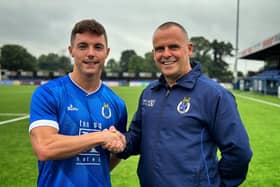 Thomas Maguire is welcomed to Dungannon Swifts by manager Rodney McAree. Picture: Dungannon Swifts FC