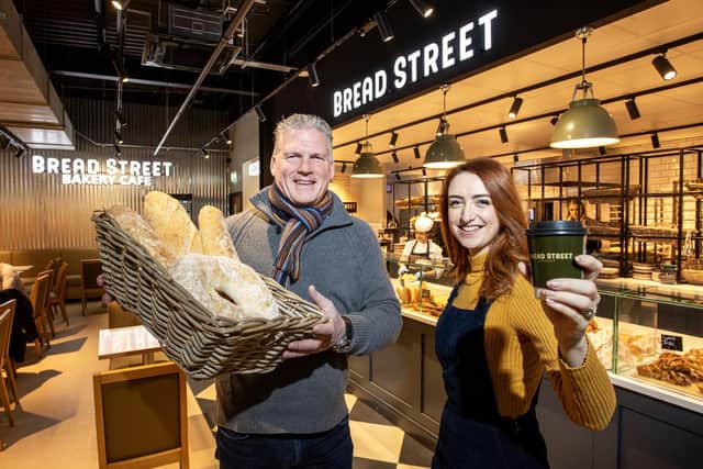 Councillor Clíodhna Nic Bhranair, chair of Belfast City Council’s City Growth and Regeneration committee is pictured with John Pell, managing director of ‘Bread Street Bakery Café’, Great Northern Mall on Victoria Street – one of a number of Belfast businesses to have benefitted from the council’s Vacant to Vibrant capital funding, helping to breathe new life into Belfast city centre and re-energising a number of vacant city centre units