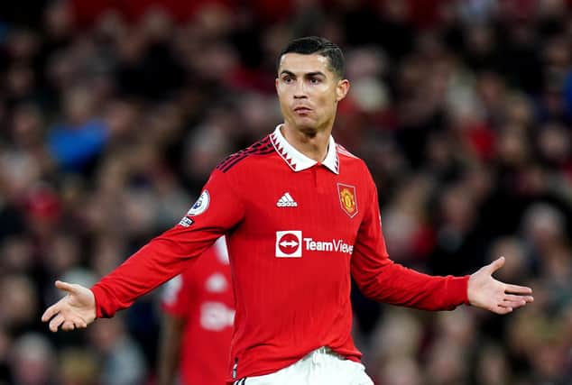 Former Manchester United player Cristiano Ronaldo has been fined £50,000 and banned for two games after an altercation with an Everton fan.