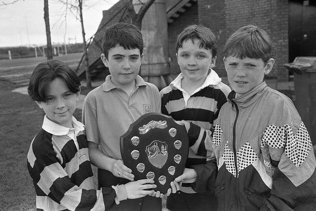 Team captains, from left, Aaron Black (Inst A), Vincent McAuley (St Joseph’s B, Larne), John McNamee (Inst B) and Eamonn Regan (St Joseph A, Larne) who fought out the semi finals of the Vi-Sport Primary School table tennis championships at Loughside Recreation Centre at the end of February 1992. Picture: News Letter archives