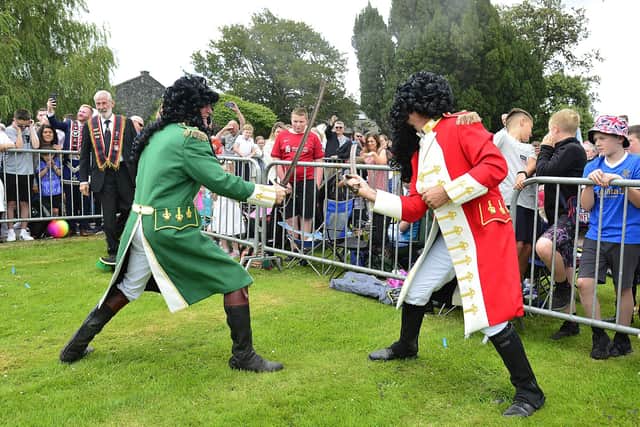 The blades of King William and King James at the Scarva Sham Fight in 2022. Picture: Arthur Allison/Pacemaker Press
