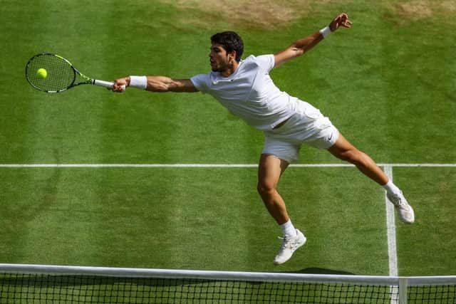 Carlos Alcaraz of Spain plays a forehand shot during the Men's Singles Final against Novak Djokovic of Serbia. Photo by Patrick Smith/Getty Images