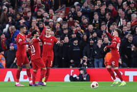 Mohamed Salah of Liverpool celebrates scoring his team's third goal with teammates Cody Gakpo, Darwin Nunez and Bobby Clark during the UEFA Europa League 2023/24 round of 16 second leg match against AC Sparta Praha at Anfield