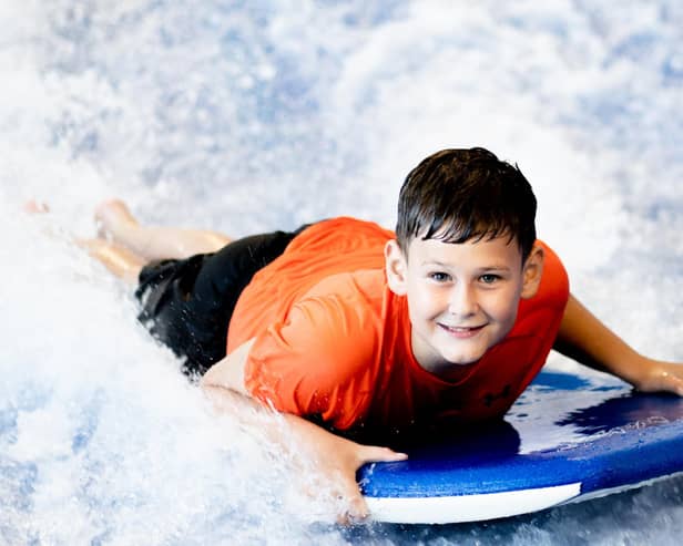 Belfast’s Better leisure centres will open their doors to the public for a weekend of free family activities in celebration of 30 years of GLL. Pictured: A young boy tests out the Surf Simulator at Andersonstown Leisure Centre, Belfast