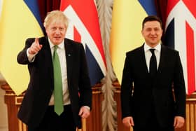 Boris Johnson in Kyiv, Ukraine as he holds crisis talks with Ukrainian president Volodymyr Zelensky amid rising tensions with Russia. Johnson has claimed that Vladimir Putin told him "I don't want to hurt you, but with a missile, it would only take a minute", in a call ahead of the Russian invasion of Ukraine.