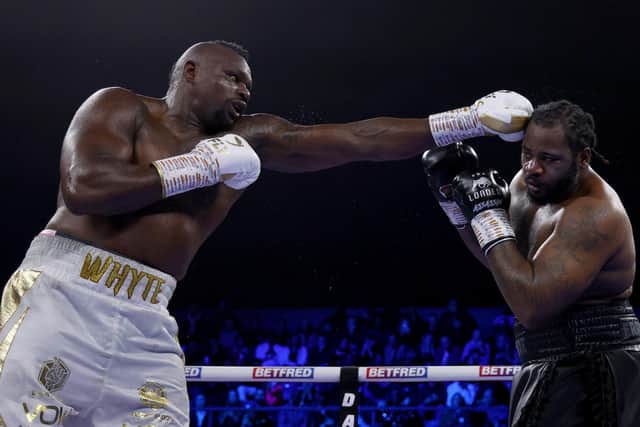 Whyte (L) exchanges punches with Jermaine Franklin during their International Heavyweight fight at Wembley Arena on Saturday. (Photo by Andrew Redington/Getty Images)