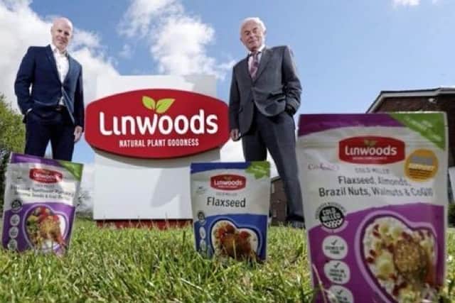 Family success: Patrick Woods, managing director, left, with his father John Woods, who founded Linwoods in Armagh