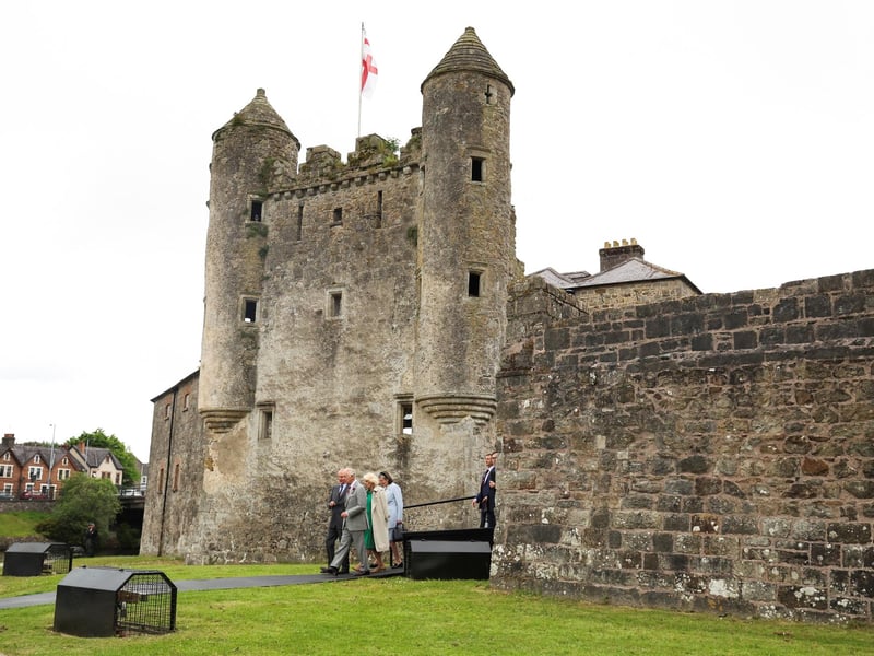 King Charles III and Queen Camilla walk as they visit Enniskillen Castle