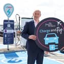 Mark Beattie, chief operating officer at Belfast City Airport, pictured with Philip Rainey, Weev CEO, announcing that Belfast City Airport has become the first airport in Northern Ireland to provide electric vehicle (EV) charging points for passengers