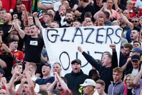 Manchester United fans wave anti-Glazer banners in the stands during a Premier League match at Old Trafford in September.