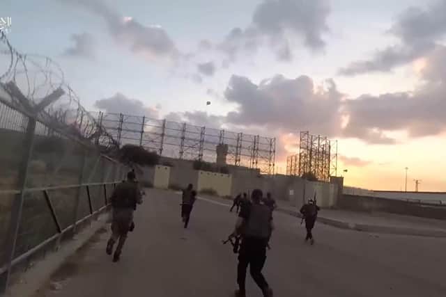 Propaganda footage released on the Qassam Brigades Telegram channel shows the Hamas assault on the ErezBeit Hanoun crossing between Israel and Gaza