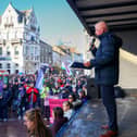 Eddie Curtis from SOS Daisy Hill speaks to crowds in Newry on Sunday about the closure of maternity services. NM264370